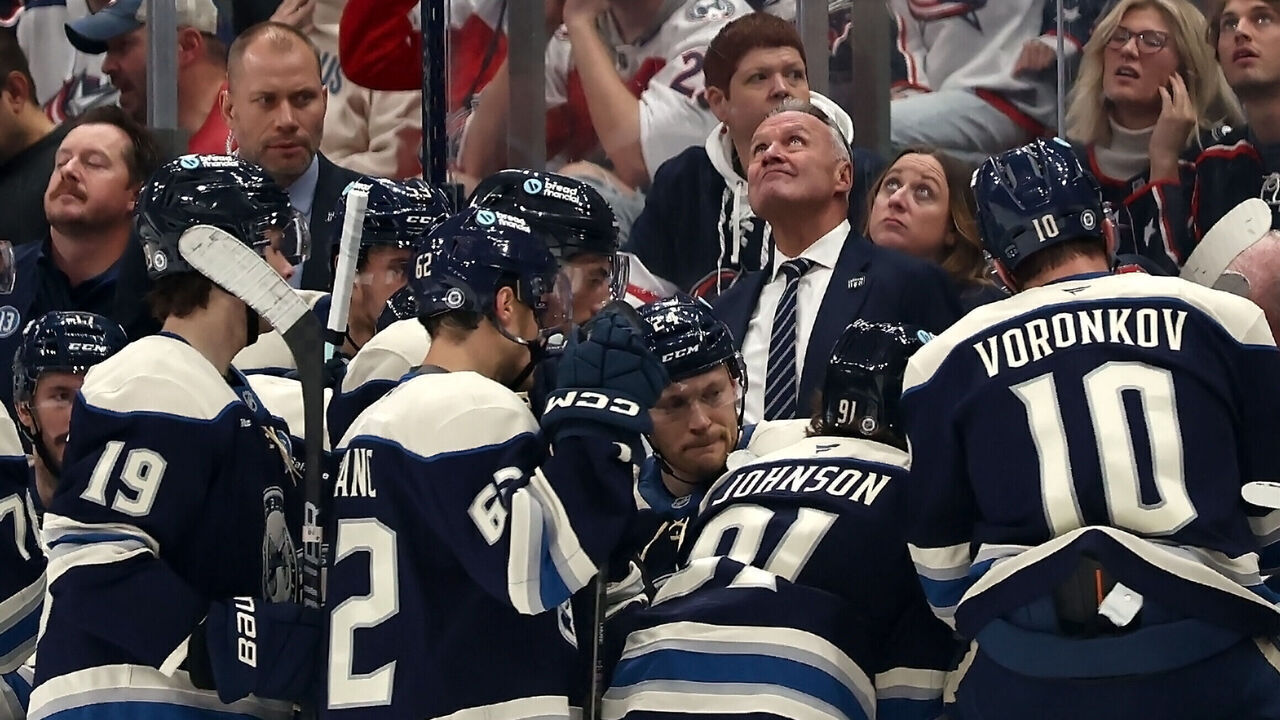COLUMBUS, OHIO - NOVEMBER 23: Head coach Dean Evason of the Columbus Blue Jackets looks up the video board during the game against the Carolina Hurricanes at Nationwide Arena on November 23, 2024 in Columbus, Ohio. Columbus defeated Carolina 5-4 in a shootout.