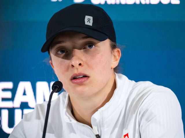 MALAGA, SPAIN - NOVEMBER 18: Iga Swiatek of Poland talks to the media after the Billie Jean King Cup Finals semi-final match between Poland and Italy at Palacio de Deportes Jose Maria Martin Carpena on November 18, 2024 in Malaga, Spain