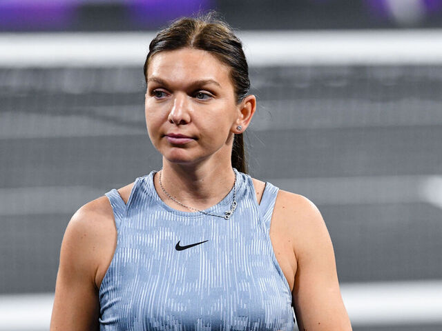 Simona Halep is in action during a tennis demo event for a sports festival in Cluj-Napoca, Romania, on June 15, 2024.