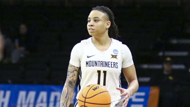 IOWA CITY, IOWA- MARCH 23: Guard JJ Quinerly #11 of the West Virginia Mountaineers during the second half against the Princeton Tigers during their match-up in the 2024 NCAA Division 1 Womens Basketball Championship at Carver-Hawkeye Arena on March 23, 2024 in Iowa City, Iowa.