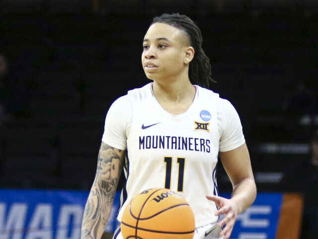 IOWA CITY, IOWA- MARCH 23: Guard JJ Quinerly #11 of the West Virginia Mountaineers during the second half against the Princeton Tigers during their match-up in the 2024 NCAA Division 1 Womens Basketball Championship at Carver-Hawkeye Arena on March 23, 2024 in Iowa City, Iowa.