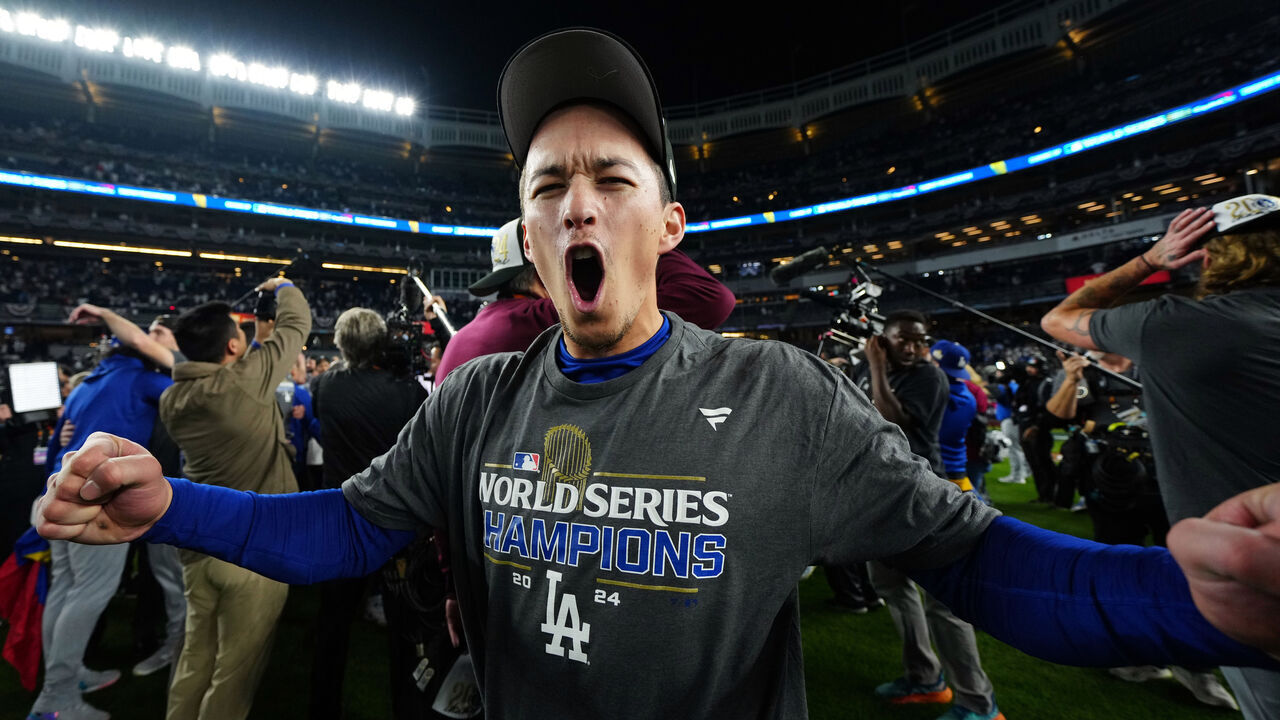 NEW YORK, NY - OCTOBER 30: Tommy Edman #25 of the Los Angeles Dodgers celebrates after the Dodgers' 7-6 victory in Game 5 to win the 2024 World Series presented by Capital One between the Los Angeles Dodgers and the New York Yankees at Yankee Stadium on Wednesday, October 30, 2024 in New York, New York.