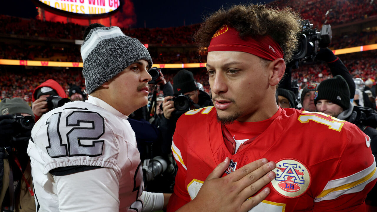 KANSAS CITY, MISSOURI - NOVEMBER 29: Aidan O'Connell #12 of the Las Vegas Raiders congratulates Patrick Mahomes #15 of the Kansas City Chiefs after the game at GEHA Field at Arrowhead Stadium on November 29, 2024 in Kansas City, Missouri.