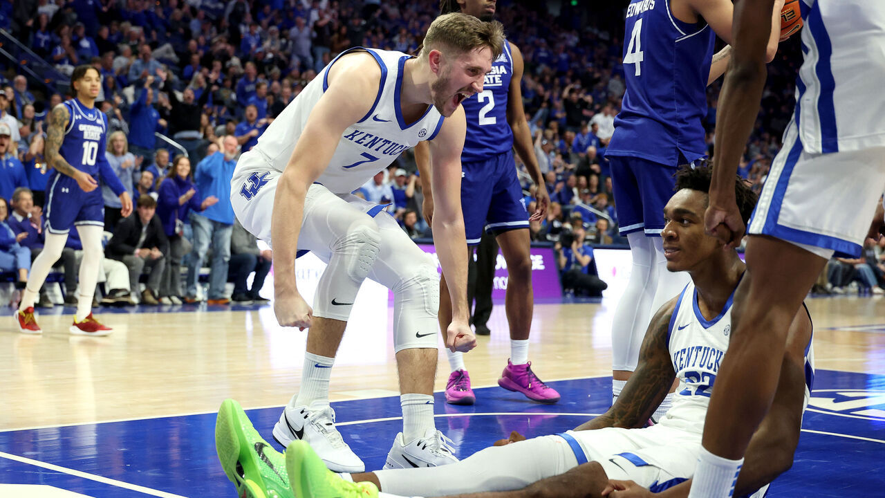 LEXINGTON, KENTUCKY - NOVEMBER 29: Andrew Carr #7 of the Kentucky Wildcats celebrates with Amari Williams #22 after Williams was fouled as he made a basket against the Georgia State Panthers at Rupp Arena on November 29, 2024 in Lexington, Kentucky.