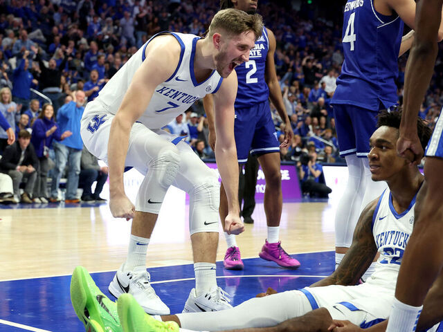LEXINGTON, KENTUCKY - NOVEMBER 29: Andrew Carr #7 of the Kentucky Wildcats celebrates with Amari Williams #22 after Williams was fouled as he made a basket against the Georgia State Panthers at Rupp Arena on November 29, 2024 in Lexington, Kentucky.