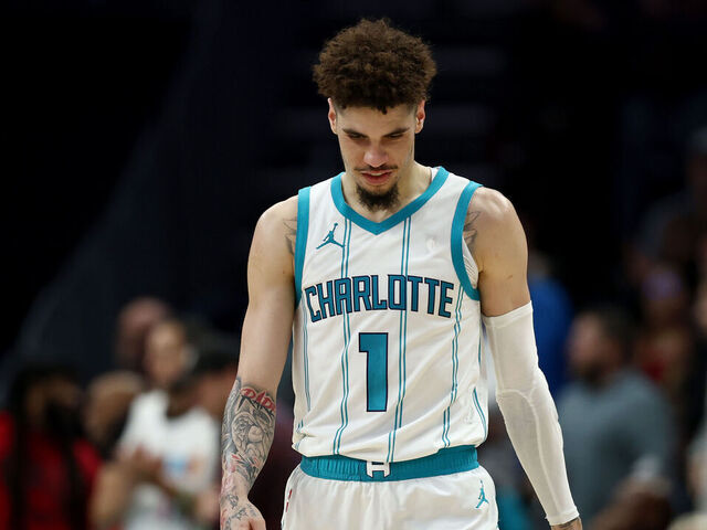 CHARLOTTE, NORTH CAROLINA - NOVEMBER 27: LaMelo Ball #1 of the Charlotte Hornets reacts during the second half of the game against the Miami Heat at Spectrum Center on November 27, 2024 in Charlotte, North Carolina.