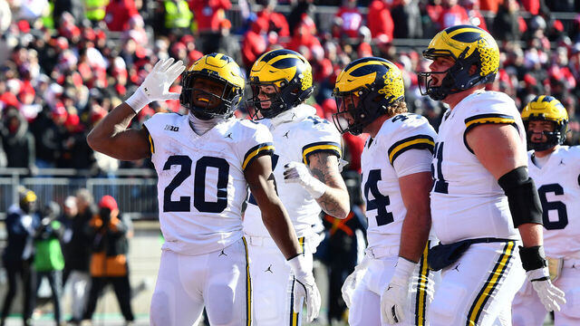 COLUMBUS, OHIO - NOVEMBER 30: Kalel Mullings #20 of the Michigan Wolverines reacts after scoring a touchdown during the second quarter of a game against the Ohio State Buckeyes at Ohio Stadium on November 30, 2024 in Columbus, Ohio.