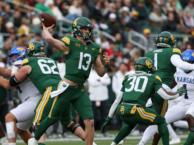 WACO, TX - NOVEMBER 30: Baylor Bears quarterback Sawyer Robertson (13) throws the ball into the flat during the Big 12 college football game between Baylor Bears and Kansas Jayhawks on November 30, 2024, at McLane Stadium in Waco, TX.