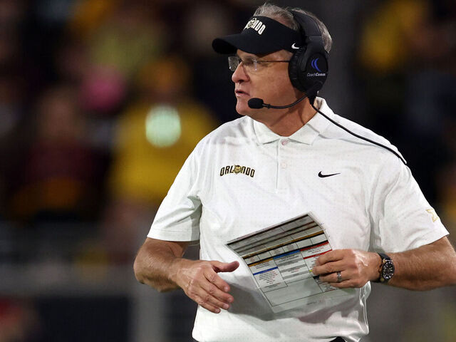 TEMPE, ARIZONA - NOVEMBER 09: Head coach Gus Malzahn of the UCF Knights looks on during the game against the Arizona State Sun Devils at Sun Devil Stadium on November 09, 2024 in Tempe, Arizona. The Sun Devils defeated the Knights 35-31.