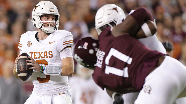 COLLEGE STATION, TEXAS - NOVEMBER 30: Quinn Ewers #3 of the Texas Longhorns looks to throw the ball during the first quarter against the Texas A&M Aggies at Kyle Field on November 30, 2024 in College Station, Texas.