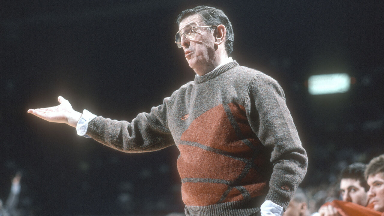LANDOVER, MD - CIRCA 1987: Head coach Lou Carnesecca of the St. John's Red Storm reacts against the Georgetown Hoyas during an NCAA College basketball game circa 1987 at the Capital Centre in Landover, Maryland. Carnesecca coached at St. John's from 1965-70 and 1973-92.