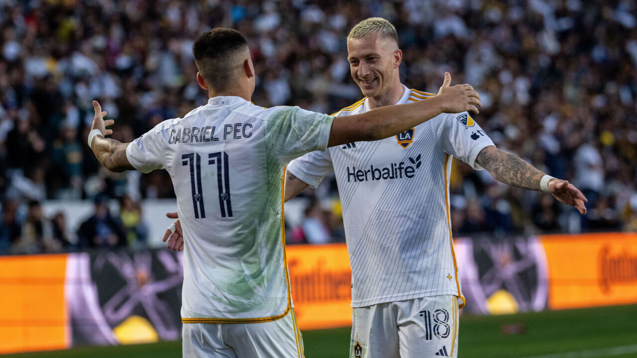 CARSON, CA - NOVEMBER 24: Gabriel Pec #11 of Los Angeles Galaxy celebrates his second goal with Marco Reus #18 of Los Angeles Galaxy during the match against Minnesota United at Dignity Health Sports Park on November 24, 2024 in Carson, California. The Los Angeles Galaxy won the match 6-2