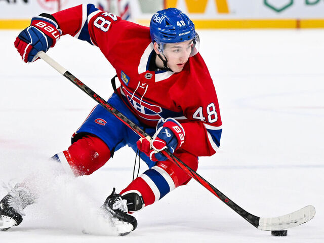 MONTREAL, CANADA - NOVEMBER 26: Lane Hutson #48 of the Montreal Canadiens skates in overtime against the Utah Hockey Club at the Bell Centre on November 26, 2024 in Montreal, Quebec, Canada. The Utah Hockey Club defeated the Montreal Canadiens 3-2 in overtime.