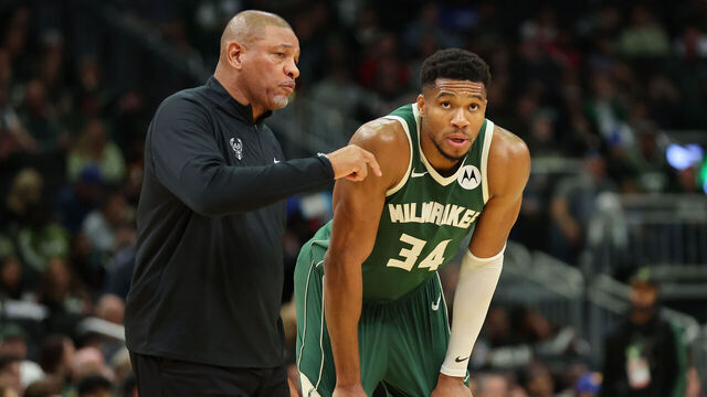 MILWAUKEE, WISCONSIN - OCTOBER 25: Giannis Antetokounmpo #34 of the Milwaukee Bucks speaks with head coach Doc Rivers during the second half of a game against the Chicago Bulls at Fiserv Forum on October 25, 2024 in Milwaukee, Wisconsin.