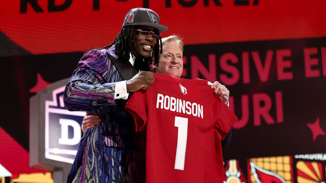 DETROIT, MICHIGAN - APRIL 25: (L-R) Darius Robinson poses with NFL Commissioner Roger Goodell after being selected 27th overall by the Arizona Cardinals during the first round of the 2024 NFL Draft at Campus Martius Park and Hart Plaza on April 25, 2024 in Detroit, Michigan.