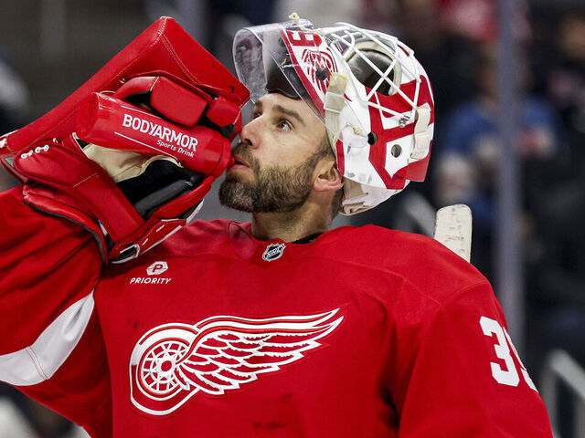 DETROIT, MICHIGAN - NOVEMBER 23: Cam Talbot #39 of the Detroit Red Wings drinks water during a timeout in the third period of a game against the Boston Bruins at Little Caesars Arena on November 23, 2024 in Detroit, Michigan.
