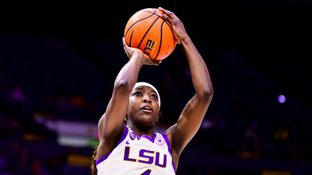 BATON ROUGE, LA - NOVEMBER 20: Flau'jae Johnson #4 of the LSU Tigers in action against the Tulane Green Wave on November 20, 2024 at the Pete Maravich Assembly Center in Baton Rouge, Louisiana.