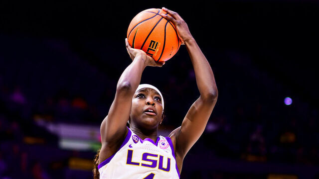 BATON ROUGE, LA - NOVEMBER 20: Flau'jae Johnson #4 of the LSU Tigers in action against the Tulane Green Wave on November 20, 2024 at the Pete Maravich Assembly Center in Baton Rouge, Louisiana.
