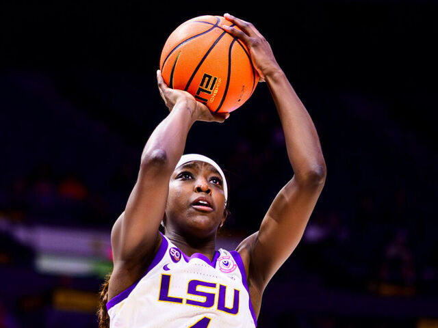 BATON ROUGE, LA - NOVEMBER 20: Flau'jae Johnson #4 of the LSU Tigers in action against the Tulane Green Wave on November 20, 2024 at the Pete Maravich Assembly Center in Baton Rouge, Louisiana.