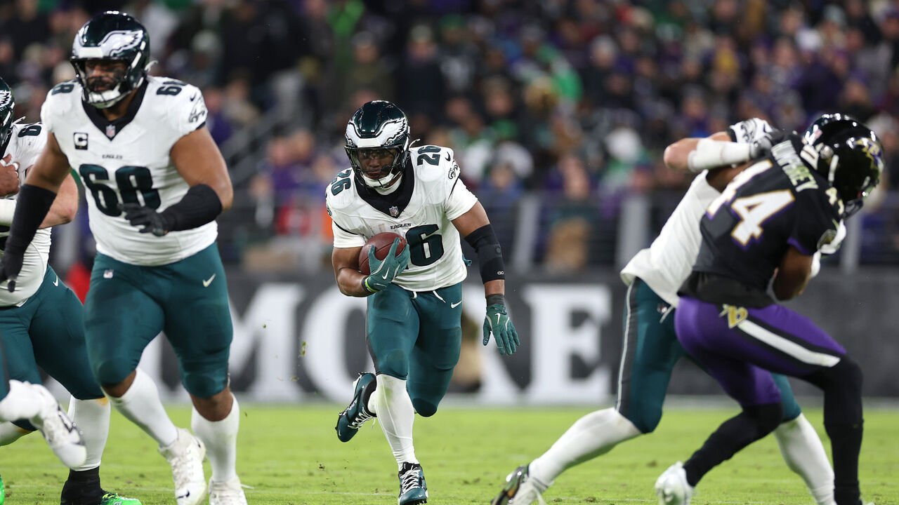 BALTIMORE, MARYLAND - DECEMBER 01: Saquon Barkley #26 of the Philadelphia Eagles runs the ball during the second quarter against the Baltimore Ravens at M&T Bank Stadium on December 01, 2024 in Baltimore, Maryland.