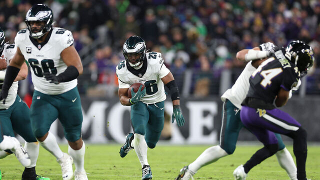 BALTIMORE, MARYLAND - DECEMBER 01: Saquon Barkley #26 of the Philadelphia Eagles runs the ball during the second quarter against the Baltimore Ravens at M&T Bank Stadium on December 01, 2024 in Baltimore, Maryland.