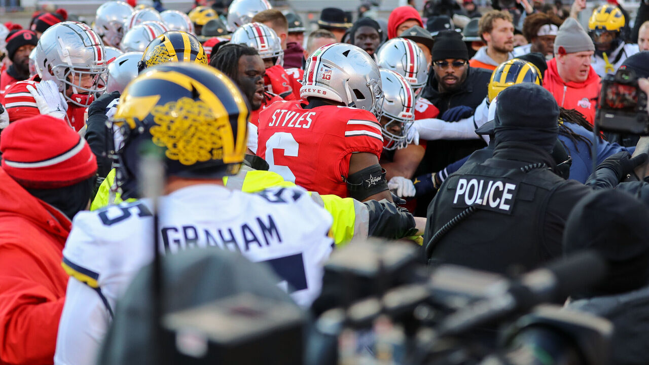 COLUMBUS, OH - NOVEMBER 30: A brawl breaks out at midfield after the game against the Michigan Wolverines and the Ohio State Buckeyes on November 30, 2024, at Ohio Stadium in Columbus, OH.