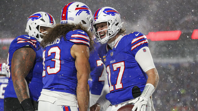 ORCHARD PARK, NEW YORK - DECEMBER 01: Josh Allen #17 of the Buffalo Bills celebrates with Mack Hollins #13 after a touchdown in the second quarter of a game against the San Francisco 49ers at Highmark Stadium on December 01, 2024 in Orchard Park, New York.
