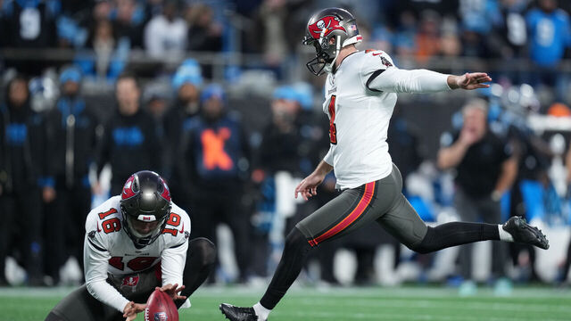 CHARLOTTE, NORTH CAROLINA - DECEMBER 01: Chase McLaughlin #4 of the Tampa Bay Buccaneers kicks a field goal during the second quarter against the Carolina Panthers at Bank of America Stadium on December 01, 2024 in Charlotte, North Carolina.