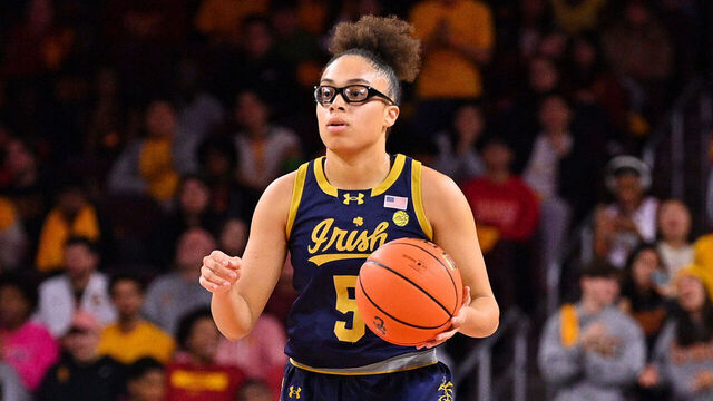 LOS ANGELES, CA - NOVEMBER 23: Notre Dame Fighting Irish guard Olivia Miles (5) dribbles up the court during the women's college basketball game between the Notre Dame Fighting Irish and the USC Trojans on November 23, 2024 at Galen Center in Los Angeles, CA.