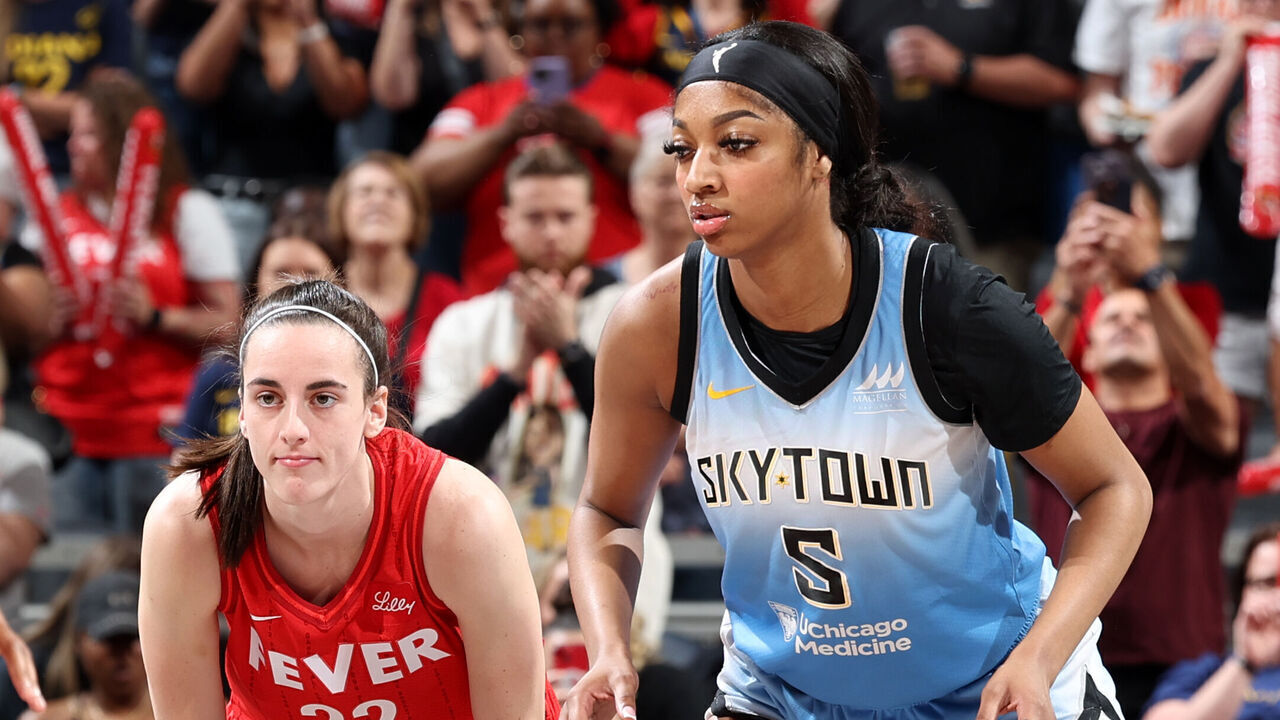 INDIANAPOLIS, IN - JUNE 1: Caitlin Clark #22 of the Indiana Fever and Angel Reese #5 of the Chicago Sky look on during the game on June 1, 2024 at Gainbridge Fieldhouse in Indianapolis, Indiana. Mandatory Copyright Notice: Copyright 2024 NBAE