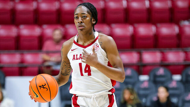 TUSCALOOSA, ALABAMA - NOVEMBER 10: Zaay Green #14 of the Alabama Crimson Tide brings the ball down court during the first half against the Troy Trojans at Coleman Coliseum on November 10, 2024 in Tuscaloosa, Alabama.