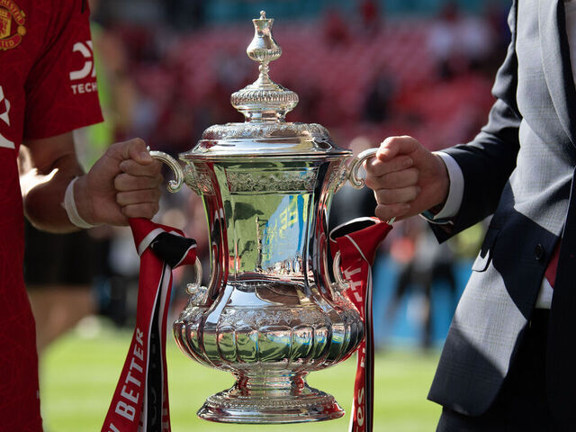 LONDON, ENGLAND - MAY 25: Manchester United manager Eric Ten Hag (left) and Bruno Fernandes hold the Emirates FA Cup trophy as they celebrate winning the Emirates FA Cup Final match between Manchester City and Manchester United at Wembley Stadium on May 25, 2024 in London, England.