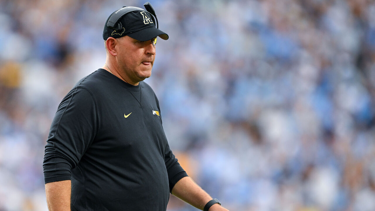 CHAPEL HILL, NORTH CAROLINA - SEPTEMBER 09: Head coach Shawn Clark of the Appalachian State Mountaineers watches his team play North Carolina Tar Heels during the game at Kenan Memorial Stadium on September 09, 2023 in Chapel Hill, North Carolina. The Tar Heels won 40-34 in double overtime.