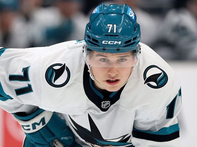 SEATTLE, WASHINGTON - NOVEMBER 30: Macklin Celebrini #71 of the San Jose Sharks looks on during the first period against the Seattle Kraken at Climate Pledge Arena on November 30, 2024 in Seattle, Washington.