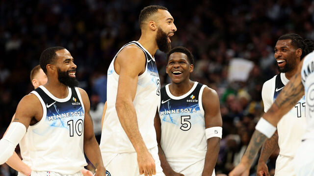 MINNEAPOLIS, MINNESOTA - DECEMBER 02: Rudy Gobert #27 of the Minnesota Timberwolves celebrates with teammates in the fourth quarter against the Los Angeles Lakers at Target Center on December 02, 2024 in Minneapolis, Minnesota. The Timberwolves defeated the Lakers 109-80.