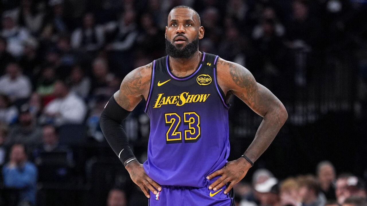 MINNEAPOLIS, MN - DECEMBER 2: LeBron James #23 of the Los Angeles Lakers looks on during the game against the Minnesota Timberwolves on December 2, 2024 at Target Center in Minneapolis, Minnesota. Mandatory Copyright Notice: Copyright 2024 NBAE