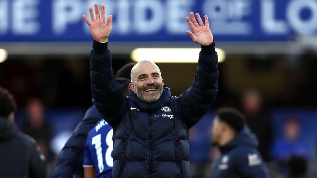 LONDON, ENGLAND - DECEMBER 01: Enzo Maresca, Manager of Chelsea, acknowledges the fans following the team's victory during the Premier League match between Chelsea FC and Aston Villa FC at Stamford Bridge on December 01, 2024 in London, England.