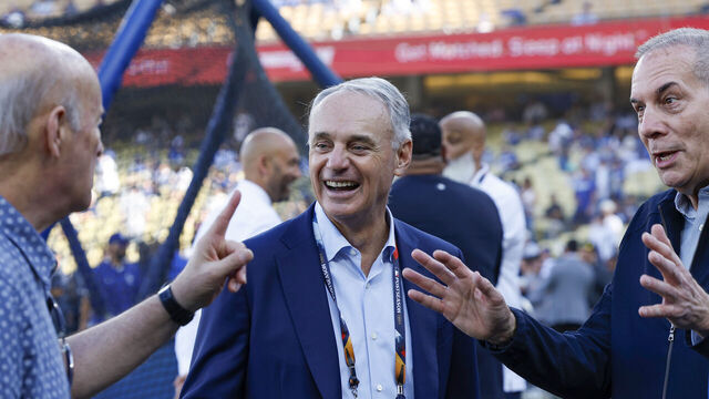 LOS ANGELES, CALIFORNIA - OCTOBER 26: Rob Manfred (C), Commissioner of Major League Baseball, is seen before the New York Yankees play the Los Angeles Dodgers during Game Two of the 2024 World Series at Dodger Stadium on October 26, 2024 in Los Angeles, California.