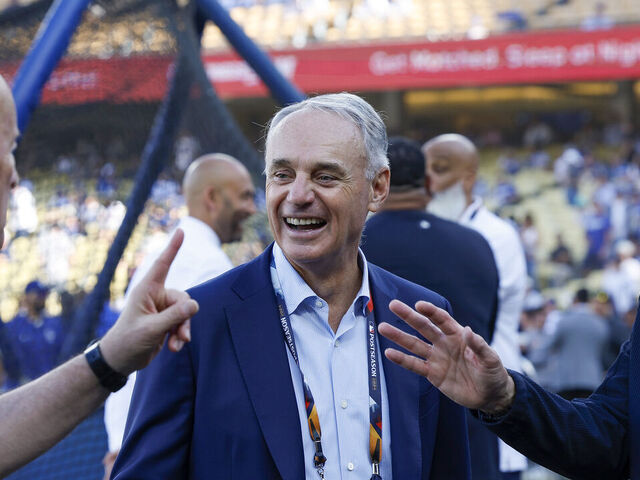 LOS ANGELES, CALIFORNIA - OCTOBER 26: Rob Manfred (C), Commissioner of Major League Baseball, is seen before the New York Yankees play the Los Angeles Dodgers during Game Two of the 2024 World Series at Dodger Stadium on October 26, 2024 in Los Angeles, California.