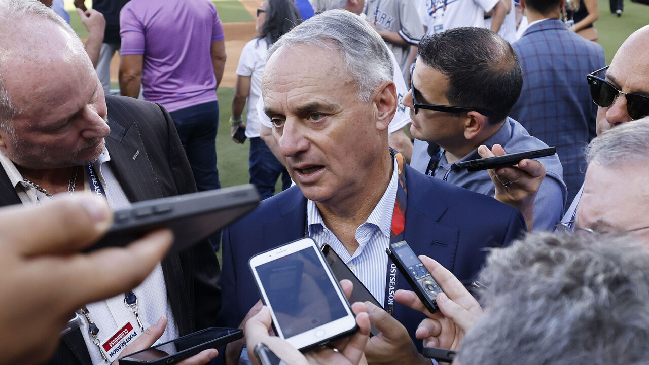 LOS ANGELES, CALIFORNIA - OCTOBER 26: Rob Manfred, Commissioner of Major League Baseball, talks to the media before the New York Yankees play the Los Angeles Dodgers during Game Two of the 2024 World Series at Dodger Stadium on October 26, 2024 in Los Angeles, California.