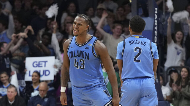 VILLANOVA, PENNSYLVANIA - DECEMBER 3: Jhamir Brickus #2 of the Villanova Wildcats celebrates with Eric Dixon #43 against the Cincinnati Bearcats in the second half at Finneran Pavilion on December 3, 2024 in Villanova, Pennsylvania. The Villanova Wildcats defeated the Cincinnati Bearcats 68-60.