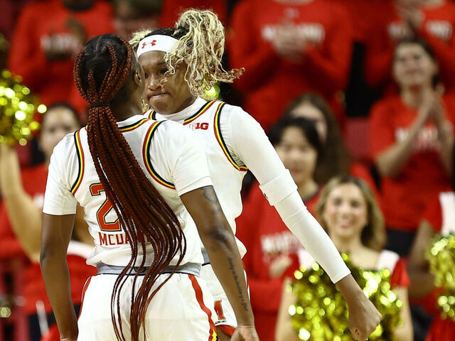 COLLEGE PARK, MARYLAND - DECEMBER 03: Bri McDaniel #24 and Christina Dalce #15 of the Maryland Terrapins react during the first half against the Mt. St. Mary's Mountaineers at Xfinity Center on December 03, 2024 in College Park, Maryland.