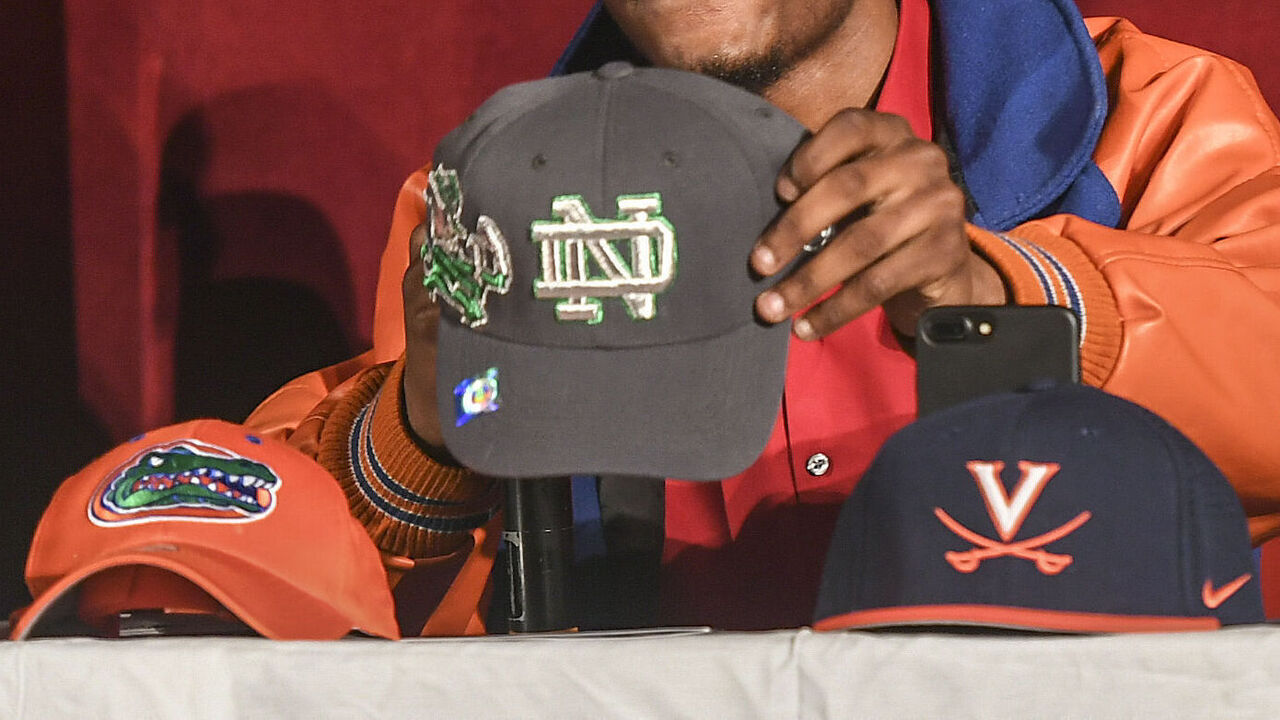 WASHINGTON, MD - FEBRUARY 7: Noah Boykin selects Notre Dame over Florida and Virginia during a National Signing day event at H.D. Woodson High School.