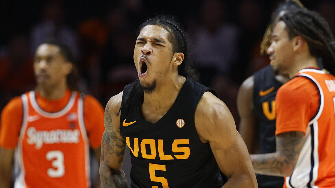 KNOXVILLE, TENNESSEE - DECEMBER 03: Zakai Zeigler #5 of the Tennessee Volunteers celebrates after a play during the first half of the game between the Tennessee Volunteers and the Syracuse Orange at Thompson-Boling Arena on December 03, 2024 in Knoxville, Tennessee.