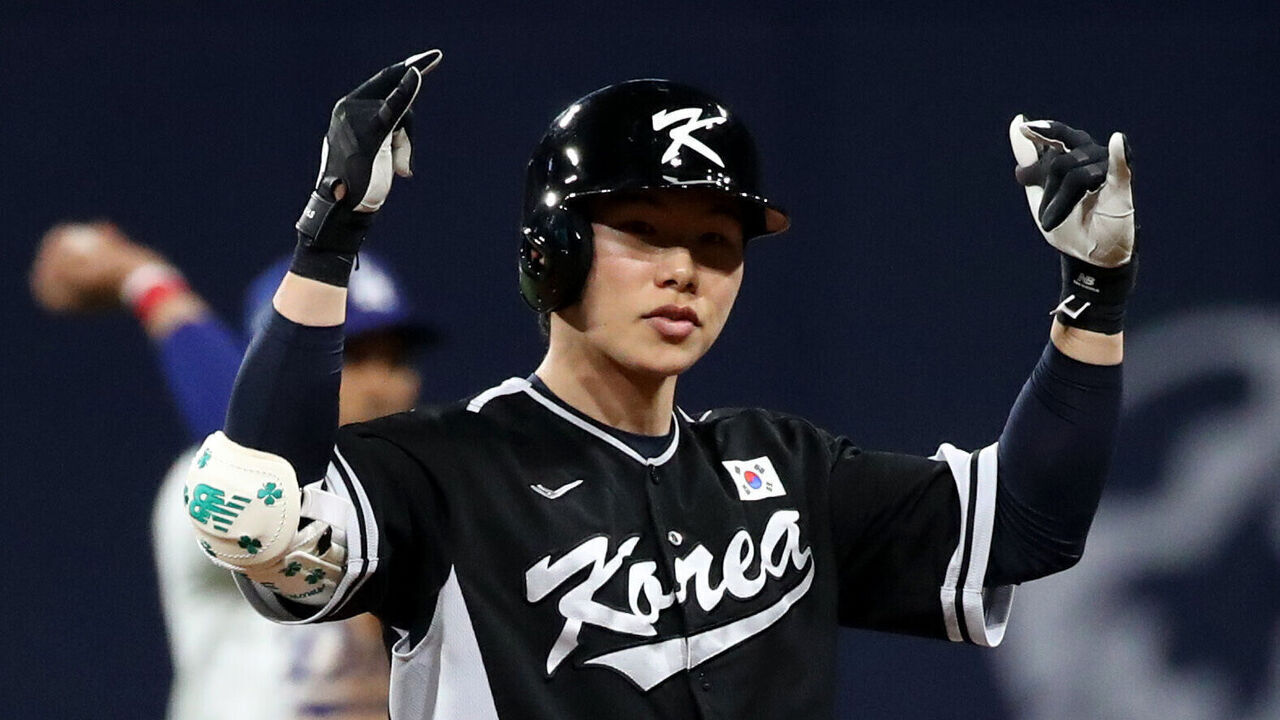SEOUL, SOUTH KOREA - MARCH 18: Kim Hye-seong #3 of Team Korea hits a double in the 3rd inning during the exhibition game between Team Korea and Los Angeles Dodgers at Gocheok Sky Dome on March 18, 2024 in Seoul, South Korea.