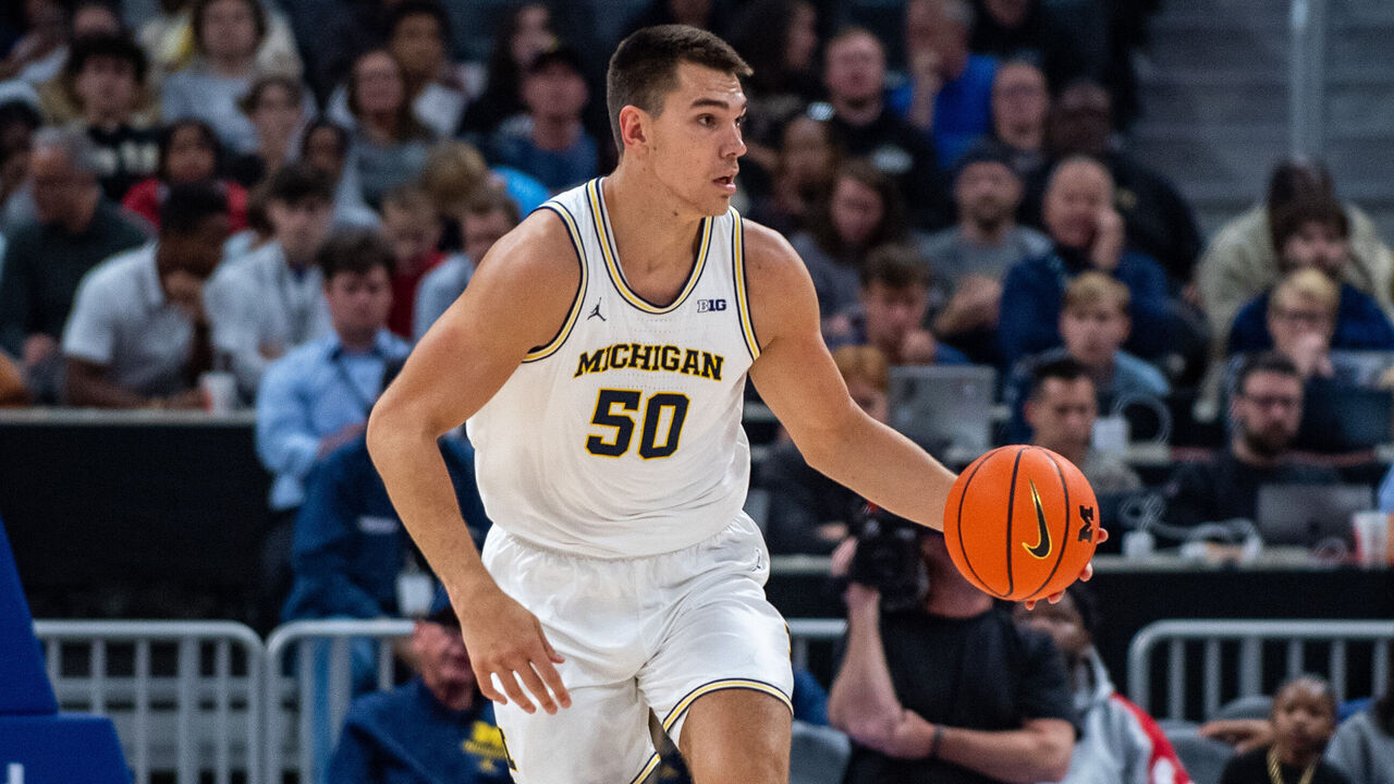 DETROIT, MICHIGAN - OCTOBER 20: Vladislav Goldin #5 of the Michigan Wolverines dribbles the ball up the court during the second half of a college basketball exhibition game against the Oakland Golden Grizzlies at Little Caesars Arena on October 20, 2024 in Detroit, Michigan.