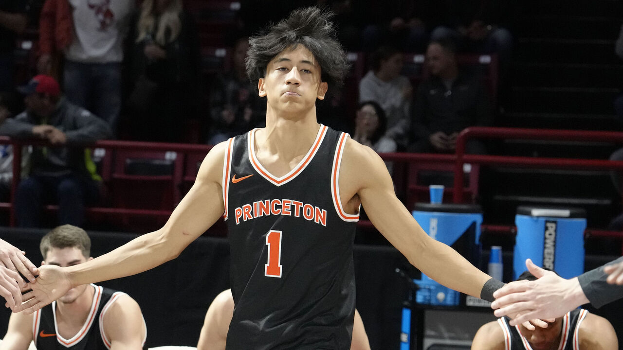 BOSTON, MASSACHUSETTS - NOVEMBER 10: Xaivian Lee #1 of the Princeton Tigers enters before a college basketball game against the Northeastern Huskies at Matthews Arena on November 10, 2024 in Boston, Massachusetts.