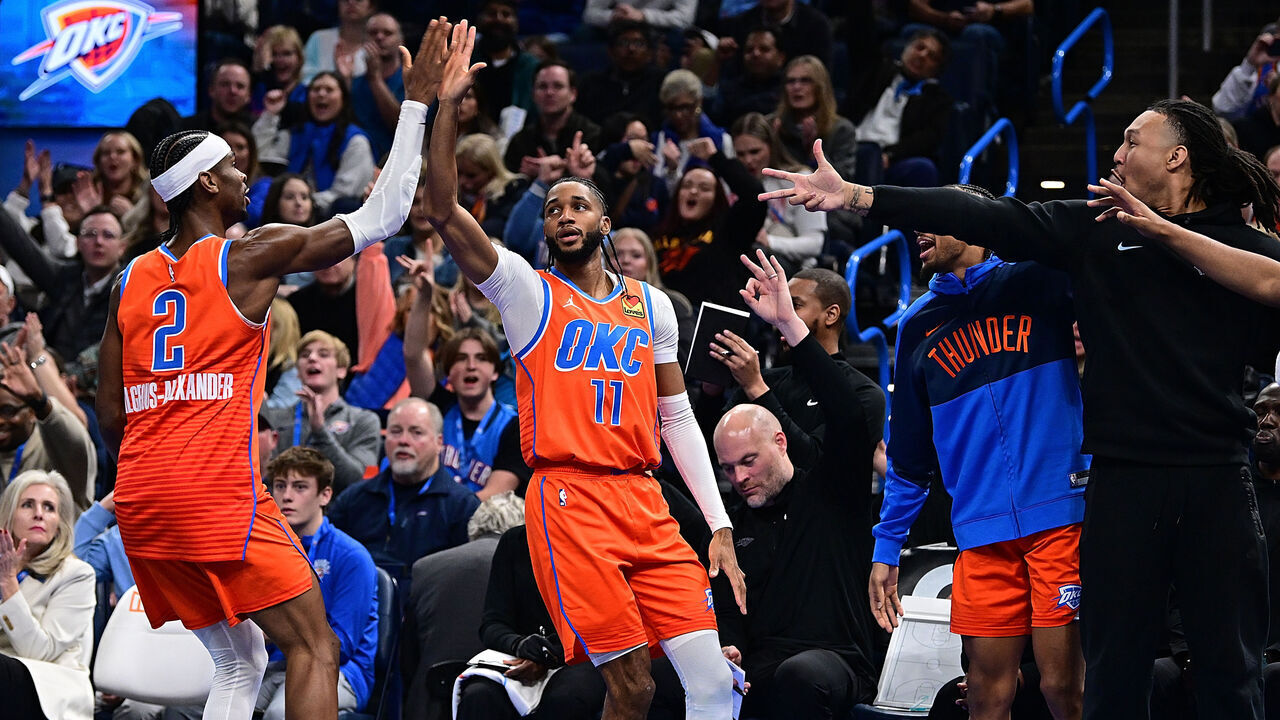 OKLAHOMA CITY, OKLAHOMA - DECEMBER 3: Isaiah Joe #11 and Shai Gilgeous-Alexander #2 of the Oklahoma City Thunder celebrate a made basket during the second half against the Utah Jazz at Paycom Center on December 3, 2024 in Oklahoma City, Oklahoma.