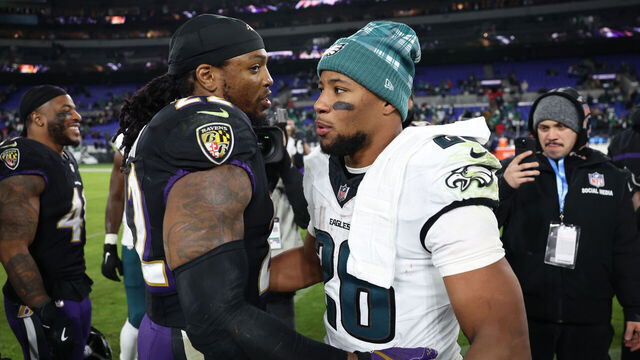 BALTIMORE, MARYLAND - DECEMBER 01: Derrick Henry #22 of the Baltimore Ravens greets Saquon Barkley #26 of the Philadelphia Eagles following the game at M&T Bank Stadium on December 01, 2024 in Baltimore, Maryland. Philadelphia defeated Baltimore 24-19.