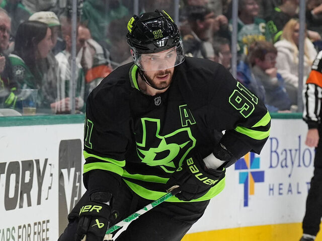 DALLAS, TX - NOVEMBER 29: Tyler Seguin #91 of the Dallas Stars handles the puck against the Colorado Avalanche at the American Airlines Center on November 29, 2024 in Dallas, Texas.